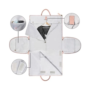 Foldable light grey travel garment bag with waterproof fabric and pink handles for gym