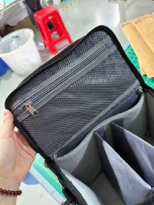 Waterproof camera shoulder bag with adjustable shockproof dividers and mesh pocket
