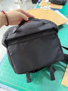 Close-up of waterproof camera shoulder bag with durable nylon and side mesh pockets