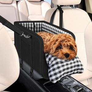 Detail of dog car armrest seat with black fabric and white checkered interior pattern