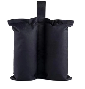 Close-up of black double-pocket canopy weights with heavy-duty industrial nylon texture