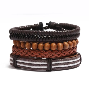 Detail view of 4-piece vintage braided leather bracelet set with wooden beads and cords