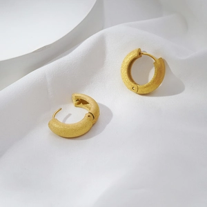 Vintage matte gold stainless steel hoop earrings with textured sandblasted finish
