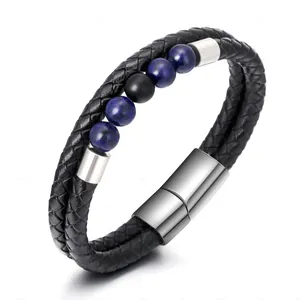 Detail view of woven black leather bracelet with natural blue stone beads and magnetic clasp