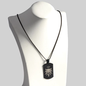 Black titanium steel dog tag necklace with The Witcher wolf logo and matte finish