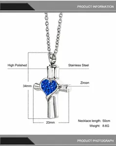 Detailed view of polished stainless steel cross necklace with a blue heart zircon stone