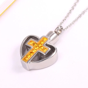 Roestvrijstalen ketting met hart en kruis parfumflesje hanger en gele kristallen