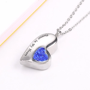 Collana a forma di cuore porta profumo in acciaio inox con cristalli blu e incisione