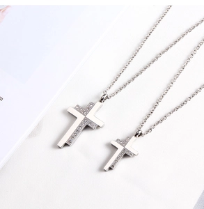 Detailed view of high-quality stainless steel cross pendants with sparkling rhinestones