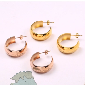 Minimalist C-shaped cross-pattern earrings in gold and rose gold stainless steel finish