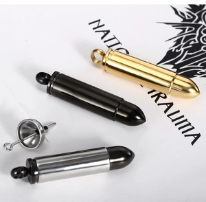 Détail des pendentifs balle creuse en or, noir et argent avec kit de remplissage