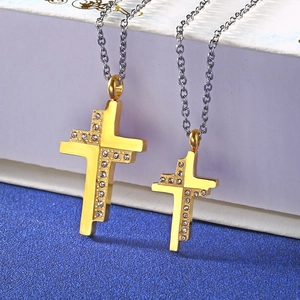 Matching cross pendants in stainless steel with crystal accents for couples