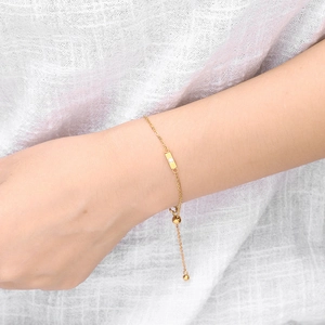 Bracelet minimaliste en acier doré avec pendentif rectangulaire et fermoir ajustable