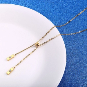 Élégant collier en Y plaqué or 18 carats avec pendentifs à glands et oxydes de zirconium