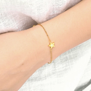 Minimalist gold star pendant necklace with zircon stone on a delicate cable chain