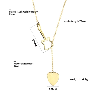 Detail view of 18k gold plated stainless steel guitar pick necklace with size dimensions