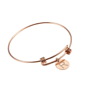 Adjustable rose gold stainless steel bangle with a polished round letter R charm pendant