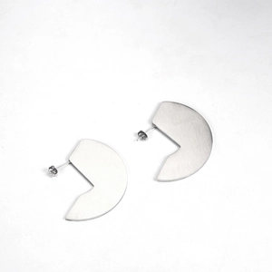 Minimalist silver fan-shaped earrings with brushed metallic texture and geometric design