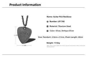 Macro shot of vintage titanium steel guitar pick necklace with engraved star and guitar text