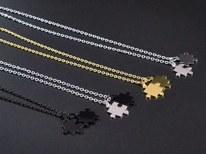 Ineinandergreifende Puzzleteile Anhänger in Silber, Gold und Schwarz mit Politur