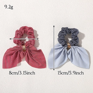 Striped bow scrunchies with gold metal ring detail in red and blue nautical patterns