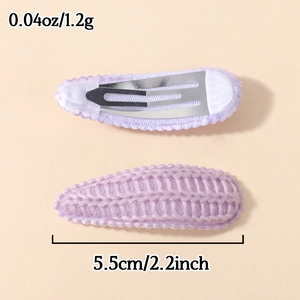 Pair of purple knitted teardrop hair clips with scalloped edges and BB clip back