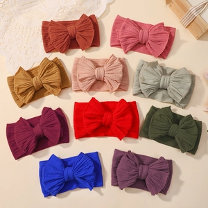 Set of 10 colorful jacquard baby headbands with large elastic bow knots for infants
