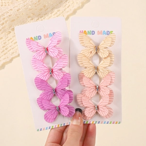 Detail of 8pcs colorful glitter butterfly hair clips with rhinestones on card
