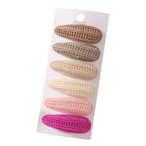 6-piece knit teardrop hair clip set in assorted colors from brown to pink on display card