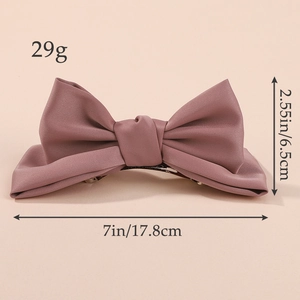 Elegant dusty pink oversized satin bow hair clip for women measuring 17.8cm in length