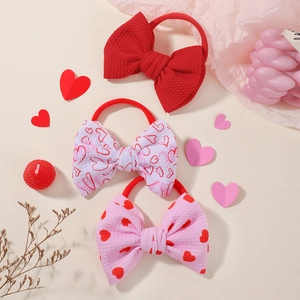 Macro detail of waffle texture bow hairbands with heart patterns for Valentine gift