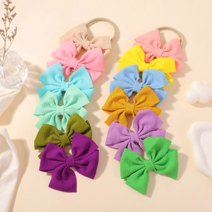 Set of 12 waffle texture baby hairbands with stretchy nylon bands in macaron colors