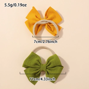Elastic waffle knit bow headbands in yellow and olive green colors with size markers