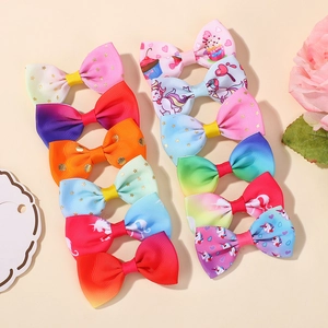 Set of 12 colorful unicorn and rainbow patterned grosgrain ribbon hair bows for girls