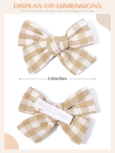 Detail showing the 3.6 inches brown checkered fabric bow with a fully covered safety clip