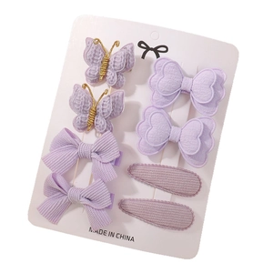 Lot de 8 barrettes à cheveux violettes avec papillons et nœuds sur carte blanche