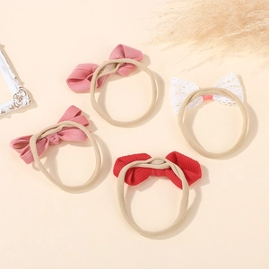 Detailed set of soft nylon baby headbands with ribbed and lace bows for infants