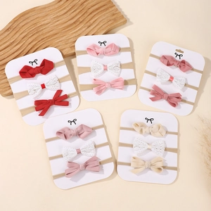15-piece baby nylon headbands set with cute soft fabric bows in assorted warm colors