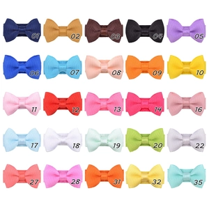 Detailed grid showing 25 colors of grosgrain ribbon bow clips with numeric style codes