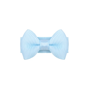 Close-up of light blue grosgrain ribbon bow hair clip showing detailed fabric texture