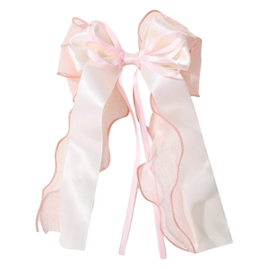 Chiffon bow hair clip featuring layered macaron pink organza and ivory satin ribbon