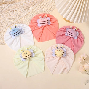 Five infant cotton turban hats in pastel colors featuring plush bee embroidery detail