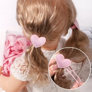 Élastiques à cheveux cœur rose brillant pour filles dans un tube pour le coiffage