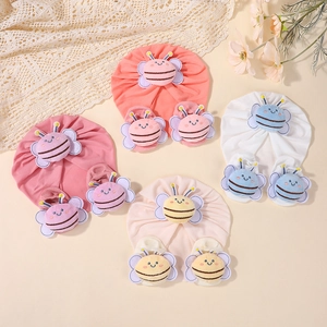 Detailed set of cotton baby hats and socks with cute 3D plush bee design in four colors