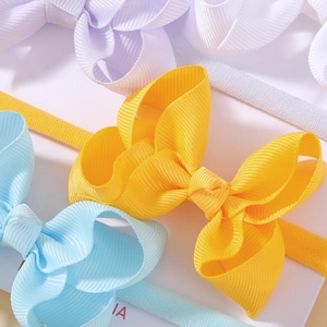 Multi-colored grosgrain ribbon bow headbands with elastic nylon bands for babies