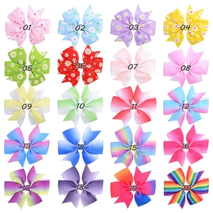 Grid view of 20 assorted colorful grosgrain ribbon bow hair clips for kids and girls
