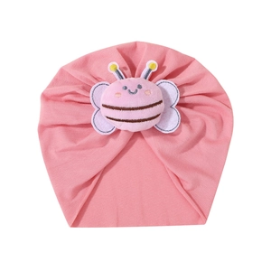 Pink knit baby beanie featuring a 3D plush bumblebee toy with soft cotton material