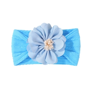 Sky blue infant headband with large fabric floral ornament and soft ribbed elastic knit