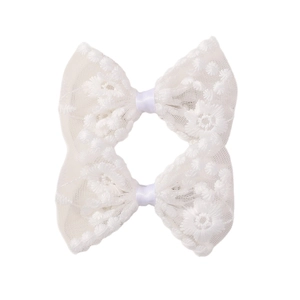 Set of two white floral lace bow hair clips for girls with sweet satin ribbon details