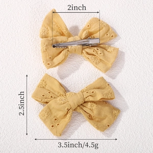 Yellow embroidered cotton bow hair clips with daisy pattern for girls 4-piece set